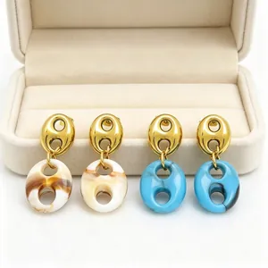 Elegant French vintage pig nose drop earrings featuring natural marble resin textures