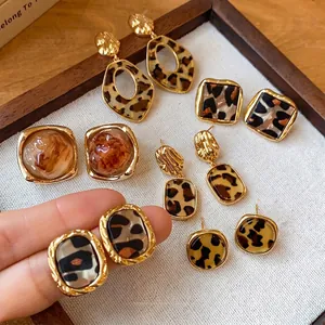 Vintage leopard print acetate earrings with 14k gold plating finish