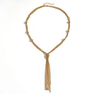 Elegante mehrlagige goldene Quastenhalskette für Damen, stilvolle Nischen-Pulloverkette.