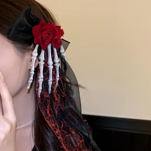 Gothic skeleton hand hair clip with red roses and black chiffon bow for Halloween cos
