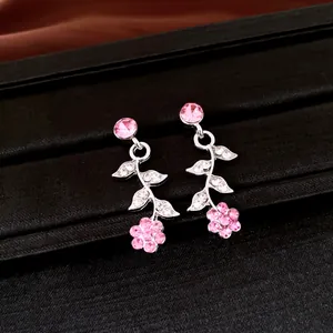 Elegant floral leaf drop earrings featuring sparkling pink and clear rhinestone crystals.