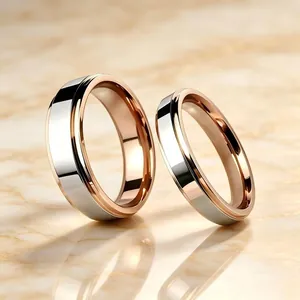Gedetailleerd overzicht van minimalistische tweekleurige ringen van roségoud en staal