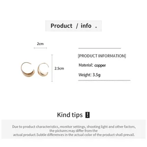 Detail of brushed copper oval hoop earrings with size dimensions and weight info.