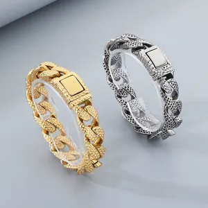 Detail view of gold and silver textured Cuban chain bracelets for men