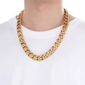 Detailed macro view of gold-plated titanium steel Cuban chain necklace with spotted texture