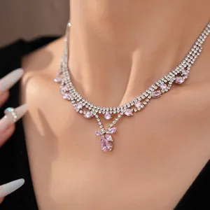Macro view of exquisite pink zirconia teardrop pendant necklace for evening dresses