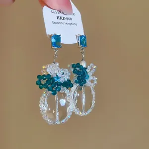 Elegante handgemaakte hanger oorbellen met blauwe zirkoon en kristallen kralen sieraden