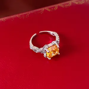 Elegant French court style silver open ring featuring a radiant square yellow zircon