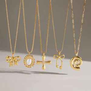 Collection of dainty gold stainless steel necklaces with various pendant designs