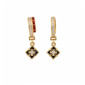 Elegant 24K gold plated earrings with zircon floral clover charms in red and black enamel