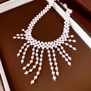 Vintage paleisstijl parelketting met handgemaakte kralenfranjes en elegantie