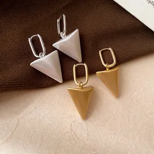 Minimalist geometric triangle pendant hoop earrings for women, gold and silver tone.
