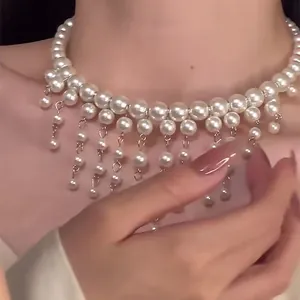 Elegant French style pearl beaded fringe choker necklace shown in detail on model neck