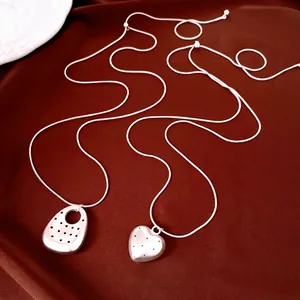 Vintage Luxus Kupfer Galvanisiert Polka Dot Herz Oval Anhänger Halskette Lange Schlangenknochenkette Schmuck Für Damen Geschenk