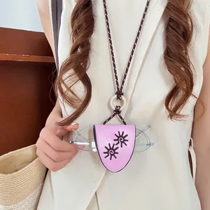 Pink leather glasses holder necklace with sun flower embroidery and braided cord.