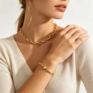Élégant ensemble collier et bracelet en maille ovale épaisse en acier inoxydable doré