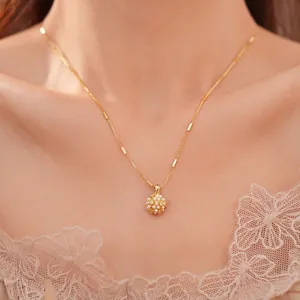 Elegant 18k gold plated necklace featuring a pearl cluster pendant on a dainty chain.