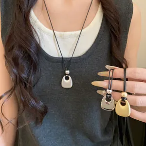 Korean style minimalist metal pendant necklaces with matte and glossy finishes for women