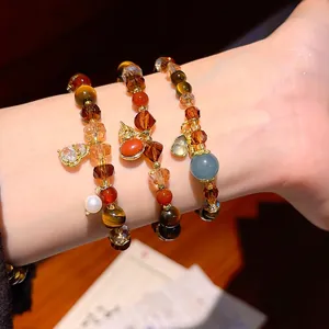 Vintage Maillard-Stil Tigerauge und Kristall Perlenarmband Set an einem Handgelenk