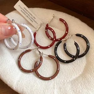 Stylish Korean-style S925 silver needle hoop earrings with colorful polka dot oil drip design.
