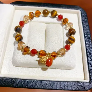 Vintage Meillard style bracelet with tiger eye beads and golden gourd charm in a gift box