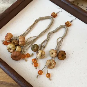 Vintage Herbst Kürbis Quastenohrringe mit Bernsteinperlen und handgefertigten Schnüren