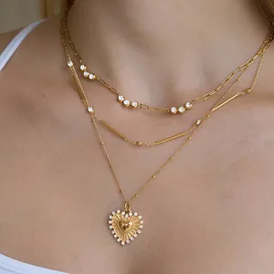 Layered 18k gold plated stainless steel necklace set with heart pendant and zircons