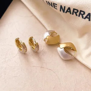 Elegant two-tone gold and silver brushed geometric heart hoop earrings for women