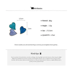 Detail view of heart-shaped alloy earrings with product dimensions and material specifications