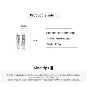Detail view of silver tassel earrings with dimensions and material specifications.