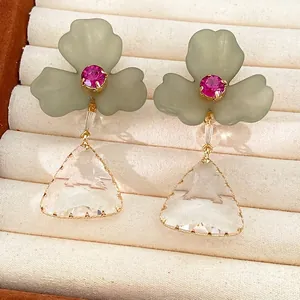 Elegant acrylic flower earrings featuring pink rhinestone and clear triangle drop charms