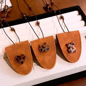 Three-piece leather resin glasses clip necklace with cat, heart, and bear charms