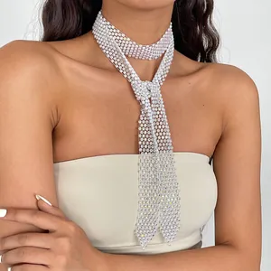 Elegant sparkling rhinestone woven tie necklace shown on model for luxury fashion detail