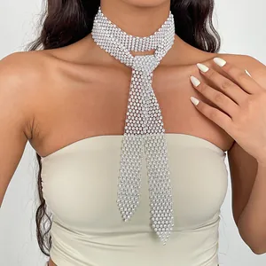 Close-up of elegant rhinestone mesh tie necklace showing sparkling diamond details