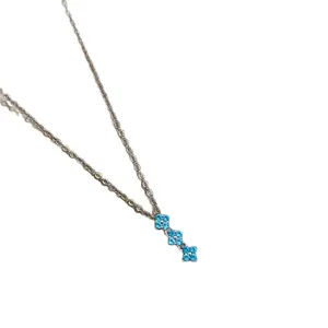 Collier délicat de style français avec pendentif fleur en zircon bleu pour femme