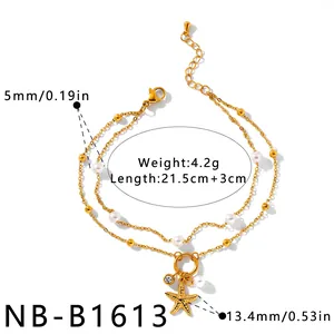 Detailed size view of gold double-layer pearl bracelet with a starfish charm