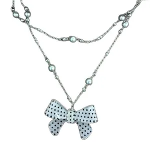 Elegante Koreaanse dubbellaagse parelketting met een grote hanger met een stippenstrik