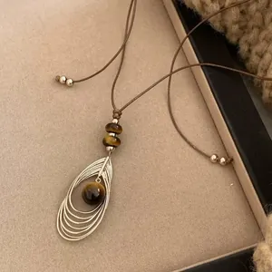 Elegante retro tijgeroog hanger ketting met bruine leren koord trui ketting accessoire