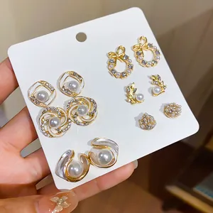Elegant French style pearl earring set with rhinestones and multiple gold plated designs