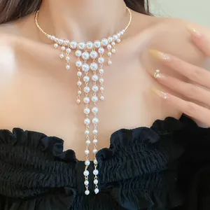 Exquisite French court style pearl choker with cascading tassel fringe detail worn by a model