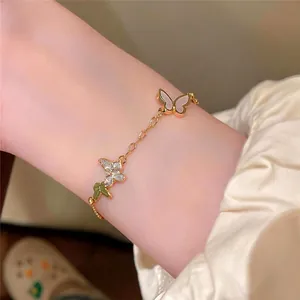 Elegant 14K gold plated butterfly bracelet with sparkling zircon inlay for women