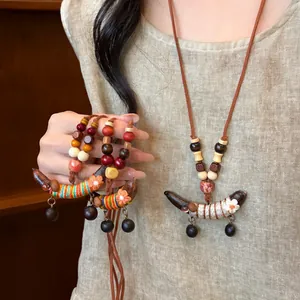 Ethnische Stil Holz Perlen Erbsenschote Anhänger Halskette Vintage Lange Pulloverkette Handgefertigte Blumen Halsschmuck Für Damen