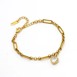 Elegant gold paperclip link bracelet featuring a sparkling heart-shaped zircon pendant.