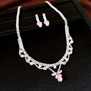 Elegant silver-tone jewelry set with pink and clear zircon crystals for weddings