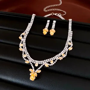 Elegantes Schmuckset mit gelben Wassertropfen-Zirkonia für Hochzeiten und Abendveranstaltungen.