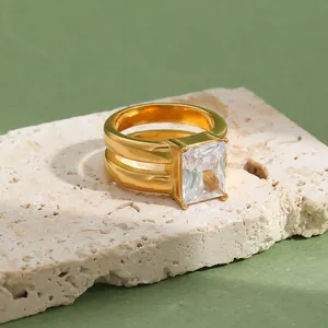 Macro view of high-quality square zircon ring with 18K gold-plated double-layer band design