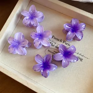 Elegant purple gradient flower mini hair claws made of translucent acrylic