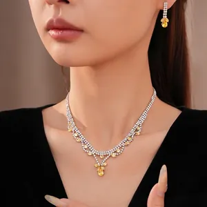 Elegante sieradenset met gele zirkonia halsketting en bijpassende oorbellen