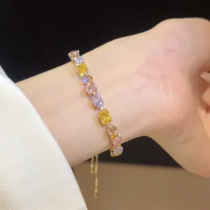 Close-up detail of luxury geometric multi-color zircon bracelet with 18k gold plating