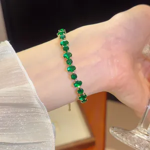 Elegant 18k gold plated tennis bracelet featuring sparkling oval green zircon stones